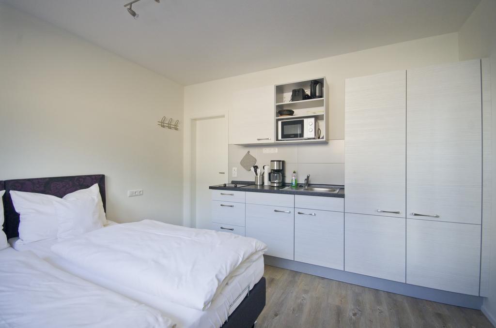 Appartements Am Kurpark Bad Windsheim Quarto foto